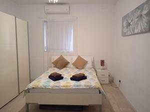 Postel nebo postele na pokoji v ubytování University Area Msida