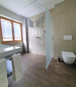 Koupelna v ubytování Hotel-Restaurant Grina