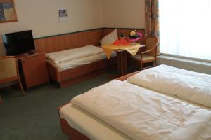 Postel nebo postele na pokoji v ubytování Hotel Ideal