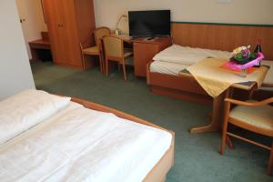 Postel nebo postele na pokoji v ubytování Hotel Ideal