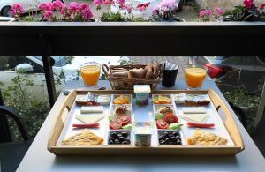 a table topped with plates of food and drinks at Apartman Istanbul in Istanbul