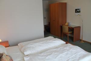 Postel nebo postele na pokoji v ubytování Hotel Ideal