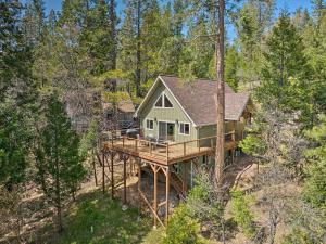 an aerial view of a house in the woods at Luxury Retreat Custom Mi-Wuk Village Cabin! in Mi-Wuk Village