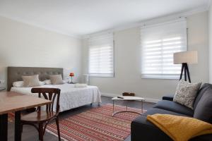 Posteľ alebo postele v izbe v ubytovaní Consell de Cent Apartment