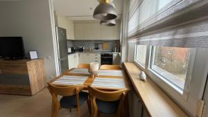 Kuchyň nebo kuchyňský kout v ubytování Elegant home in Palanga centre