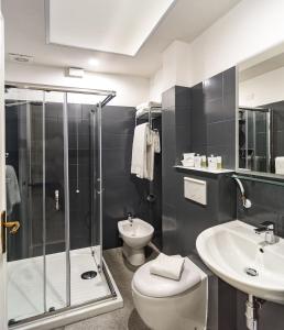 Łazienka w obiekcie City Hotel