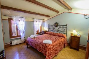 Un ou plusieurs lits dans un hébergement de l'établissement Albergo Diffuso Borgo Montemaggiore