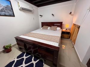 Кровать или кровати в номере Jasmine Heritage