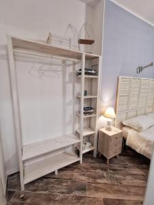 Postel nebo postele na pokoji v ubytování L' Ora Blu