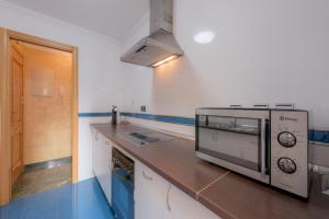 Kuchyň nebo kuchyňský kout v ubytování Apartamento Céntrico Sibarys-3 dormitorios