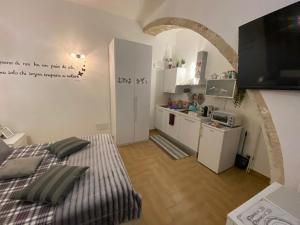 A kitchen or kitchenette at Residence Emozioni Ortigia