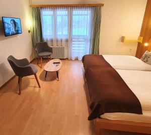 Postel nebo postele na pokoji v ubytování Hotel-Restaurant Grina