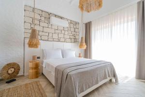 A bed or beds in a room at Voger Alaçatı Silence