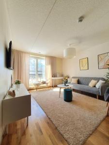 TV a/nebo společenská místnost v ubytování Ellivuori Resort Hehku