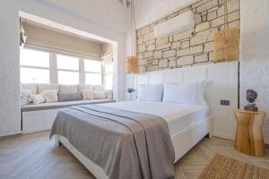 A bed or beds in a room at Voger Alaçatı Silence