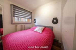 Säng eller sängar i ett rum på Cœur d'Ax Location