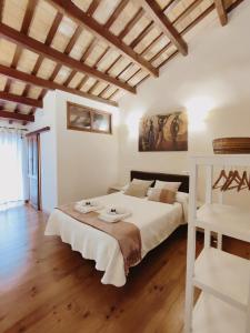 Säng eller sängar i ett rum på Casa Telégrafos