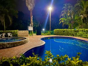 Bazén v ubytování Finca Hotel Cabaña Fercho nebo v jeho okolí