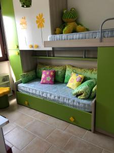 Poschodová posteľ alebo postele v izbe v ubytovaní Condominio Saint Michel