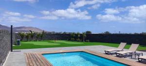 Bazén v ubytování Villa Geneva - Relax y diversión nebo v jeho okolí