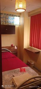 Postel nebo postele na pokoji v ubytování Villa de María