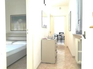 Ένα ή περισσότερα κρεβάτια σε δωμάτιο στο Casina di Levante e Casina di Ponente