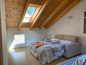Postel nebo postele na pokoji v ubytování Al Castello