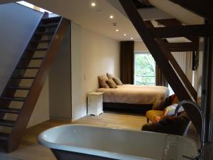Postel nebo postele na pokoji v ubytování B&B Les Tilleuls + 37 fotografií