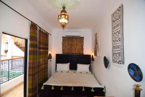 Riad Vis Ta Vie客房内的一张或多张床位