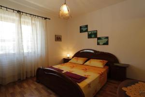 Postel nebo postele na pokoji v ubytování Apartments Golondrina