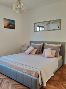 Postel nebo postele na pokoji v ubytování Apartments Golondrina