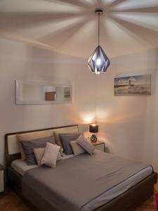 Postel nebo postele na pokoji v ubytování Apartments Golondrina