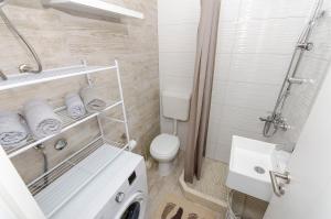 Kúpeľňa v ubytovaní Apartment Paradise + 23 fotografií