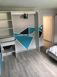 Postel nebo postele na pokoji v ubytování Le Gîte du Petit Béret
