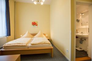 Letto o letti in una camera di Hotel Graf Waldersee