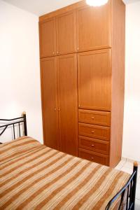 A bed or beds in a room at Driopida 5 Irida