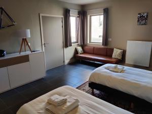 Postel nebo postele na pokoji v ubytování Flandrien Hotel