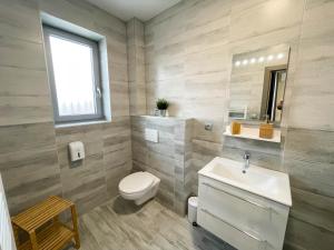 Kúpeľňa v ubytovaní Apartmány Katalin