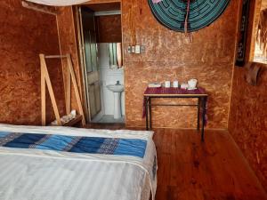 Giường trong phòng chung tại Little Mai Chau Home Stay