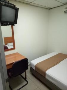 Postel nebo postele na pokoji v ubytování SHA LA LA