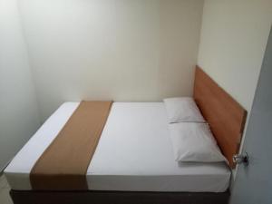Postel nebo postele na pokoji v ubytování SHA LA LA