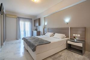 Postel nebo postele na pokoji v ubytování Apollo Hotel 1 + 37 fotografií