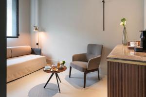 A seating area at Byssus Suites
