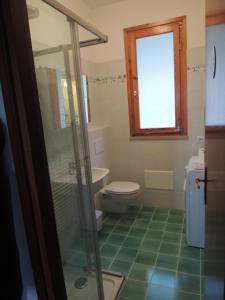 Koupelna v ubytování Casa Merlo + 32 fotografií