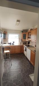 Dapur atau dapur kecil di Sleeps 8 - 3 Bedrooms