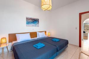 Postel nebo postele na pokoji v ubytování Sacada Seascape Nisyros