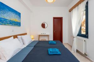 Postel nebo postele na pokoji v ubytování Sacada Seascape Nisyros