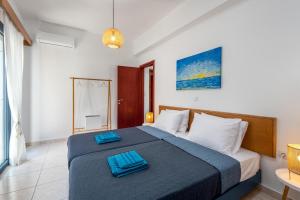 Postel nebo postele na pokoji v ubytování Sacada Seascape Nisyros
