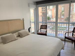 A bed or beds in a room at Happy stay