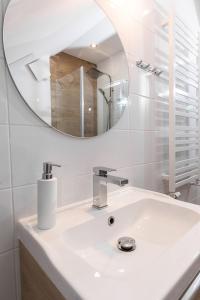 Kúpeľňa v ubytovaní Apartamenty Jantar